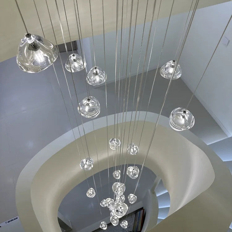 Lustra Vela modern crystal chandelier with chrome finish and transparent glass drops—Scandinavian semi-flush ceiling light for living rooms, dining areas, and entryways.