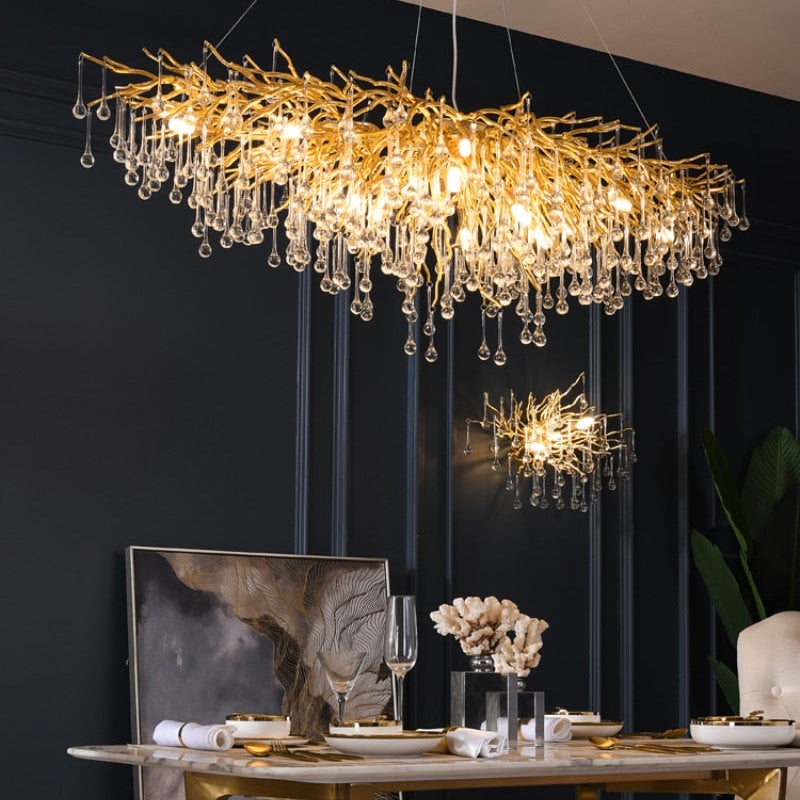 Lights of Scandinavia - ooze - "-What on earth is that majestic being hanging from the ceiling?" Majestic crystal chandelier. Unique lighting for dining rooms, living areas, entrance halls, hotel areas, restaurants, etc. K9 crystals with silver/gold metal plated aluminum frame. - A work of art. 2 sizes - 2 colors L120cm: L120xW50xH35cm, 12-25m2 L160cm: L160xW55xH35cm, 16kg, 15-30m2