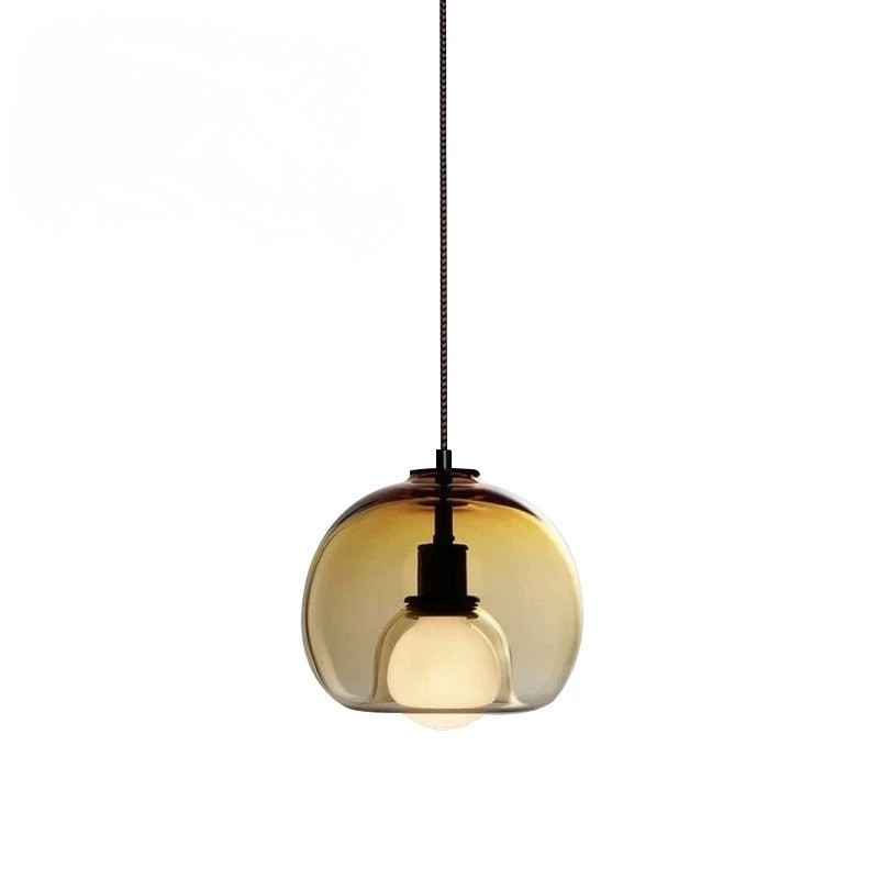 Orbis pendant light with Nordic-inspired glass design casting warm ambient glow for modern interiors