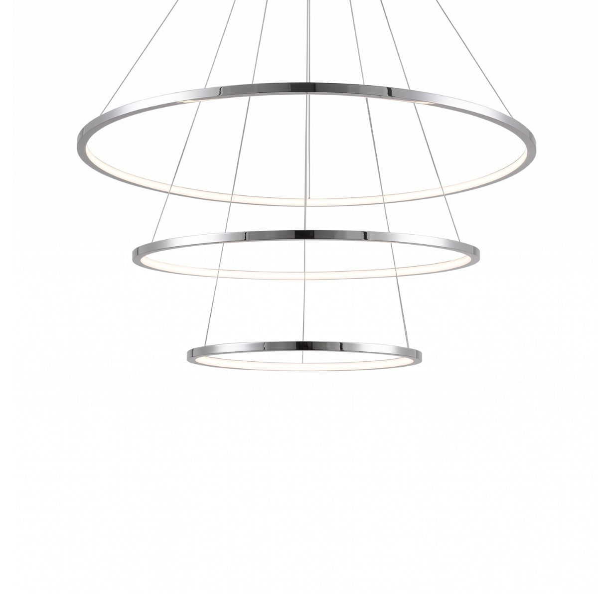 A modern three-tiered linear pendant light fixture with a polished chrome finish and glowing white LED rings, suspended by thin cables against a plain white background.